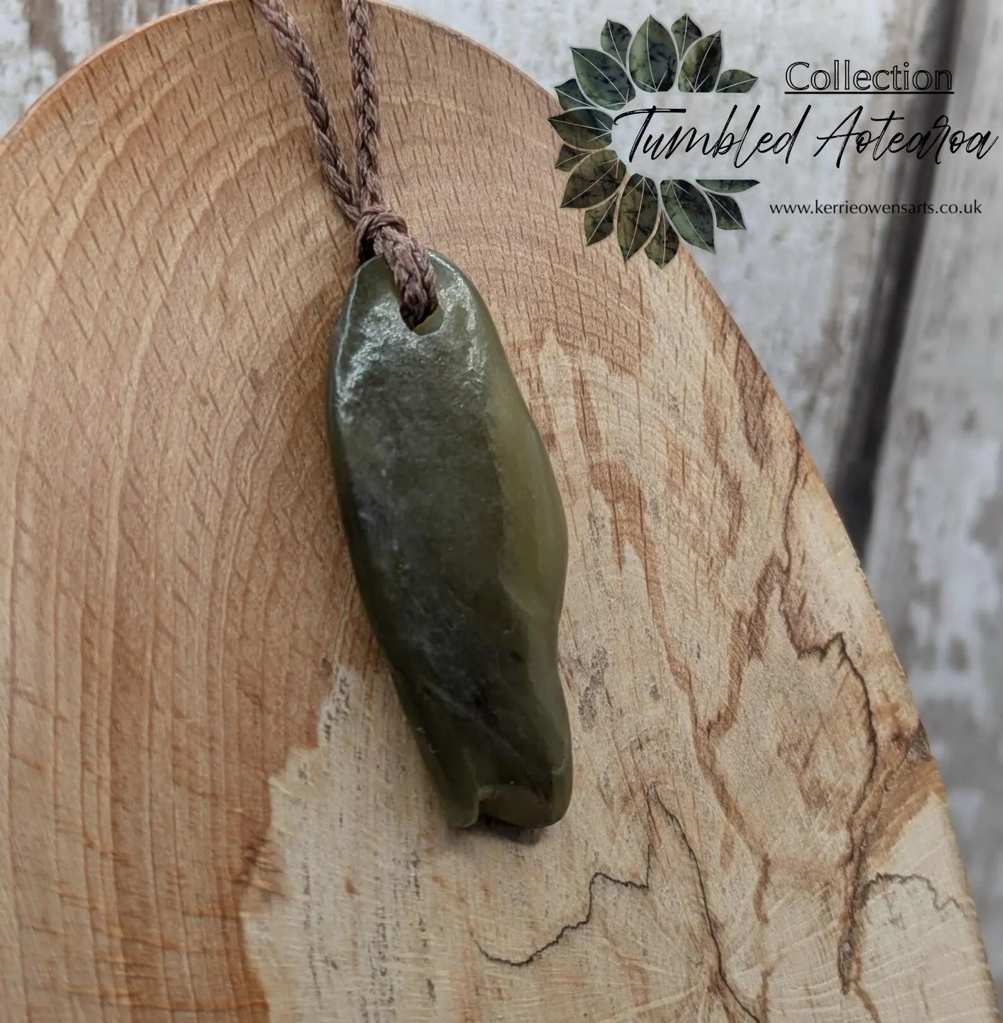 New Zealand tumbled Pounamu greenstone pendant.