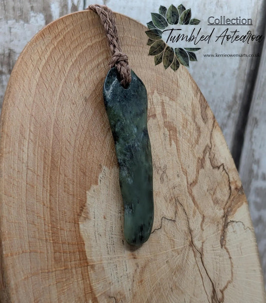 New Zealand Pounamu greenstone tumbled pendant.