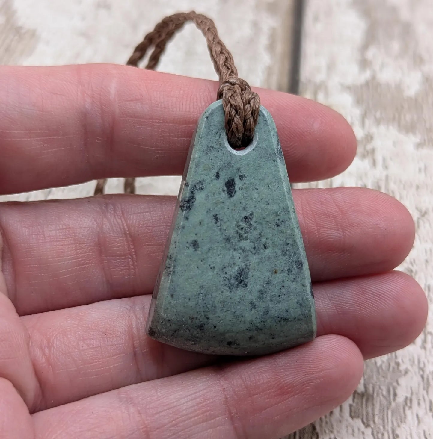 New Zealand pounamu greenstone jade her toki adze style pendant.