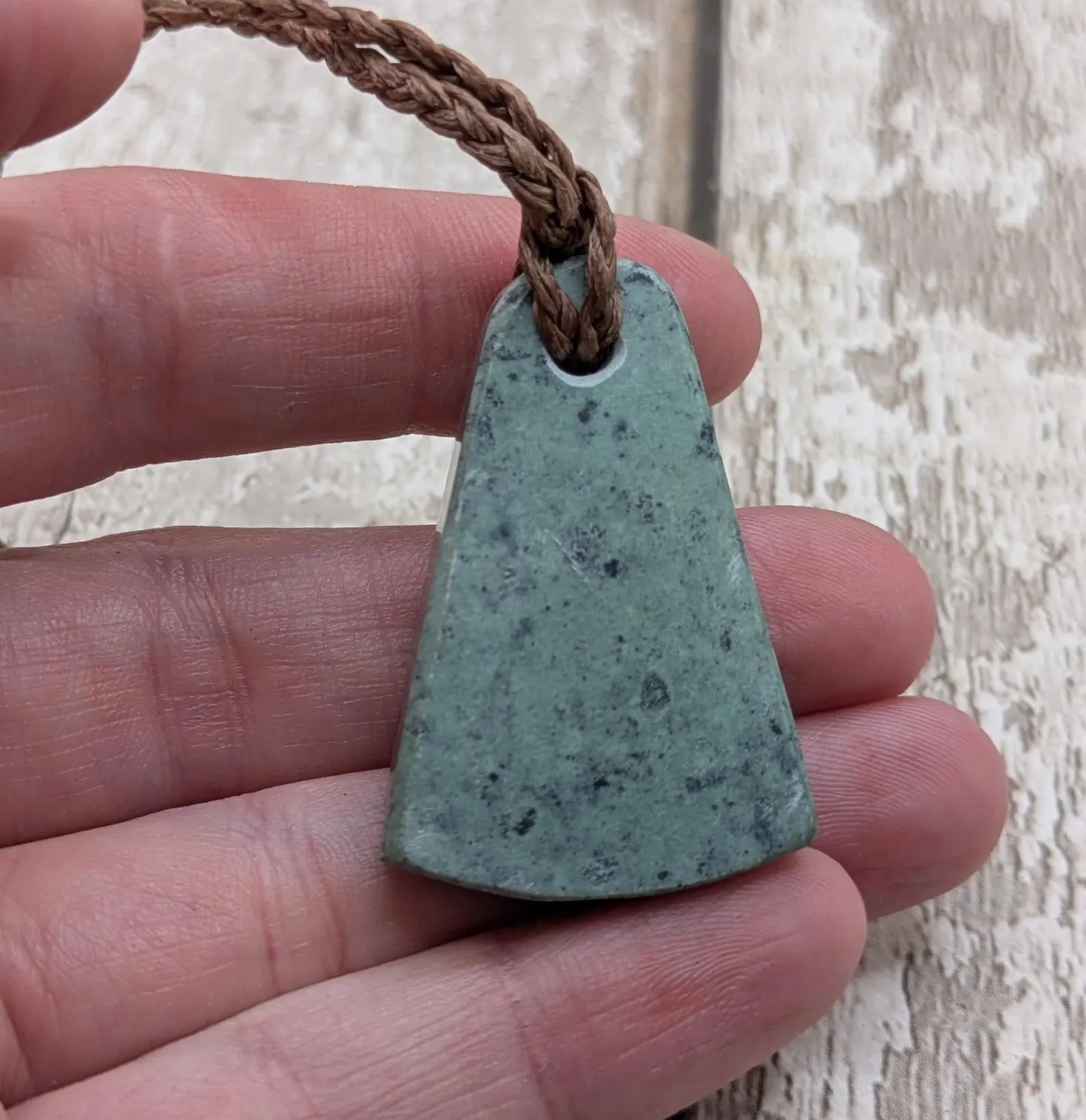 New Zealand pounamu greenstone jade her toki adze style pendant.