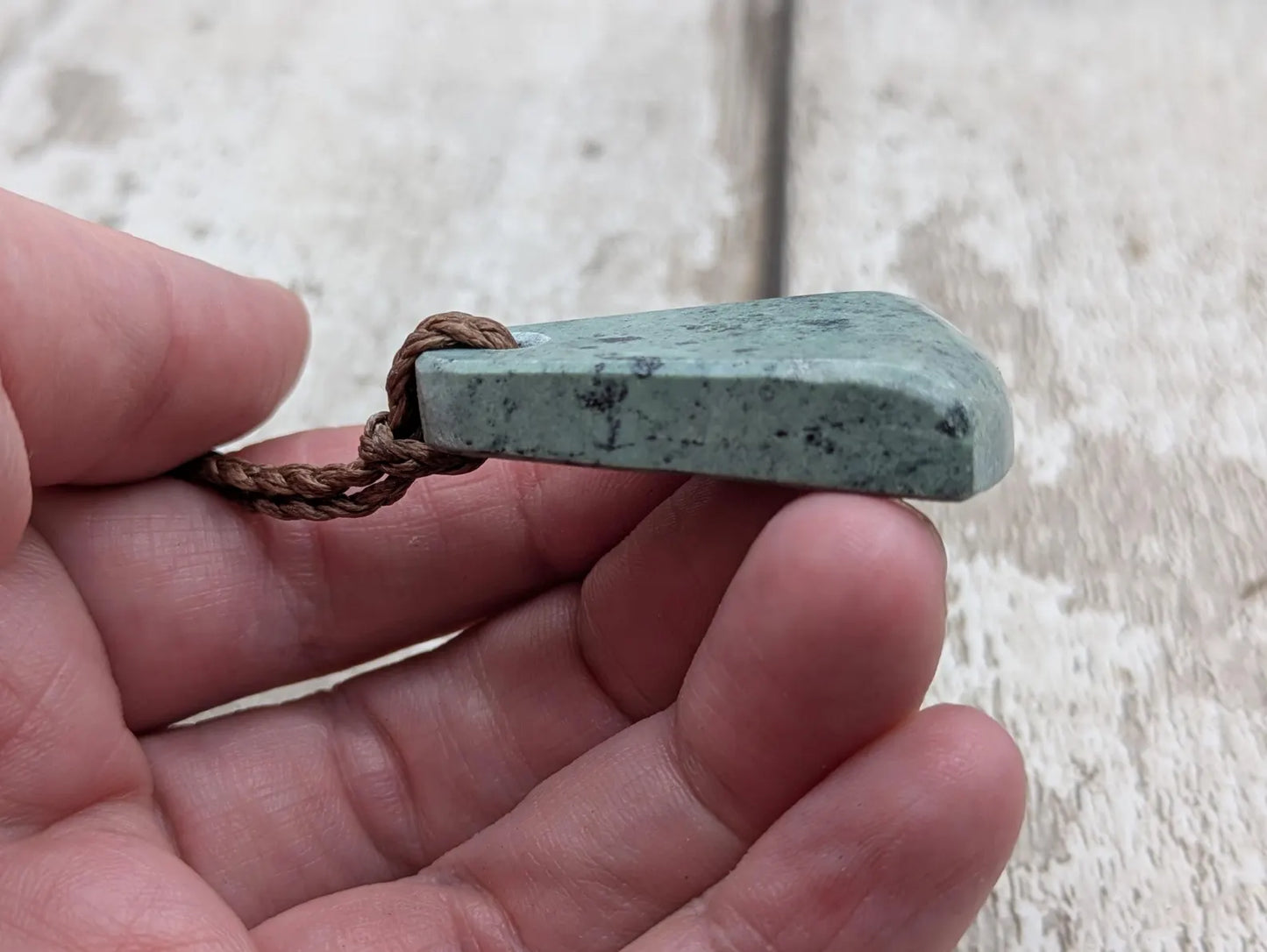 New Zealand pounamu greenstone jade her toki adze style pendant.
