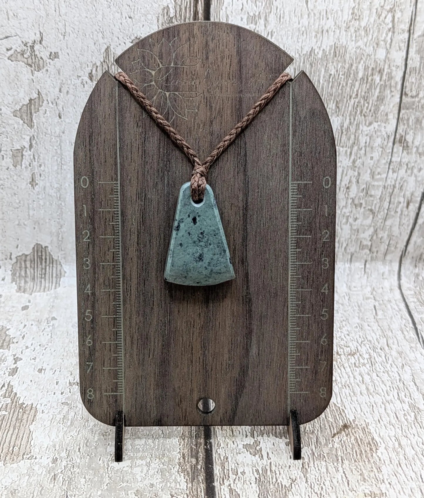 New Zealand pounamu greenstone jade her toki adze style pendant.