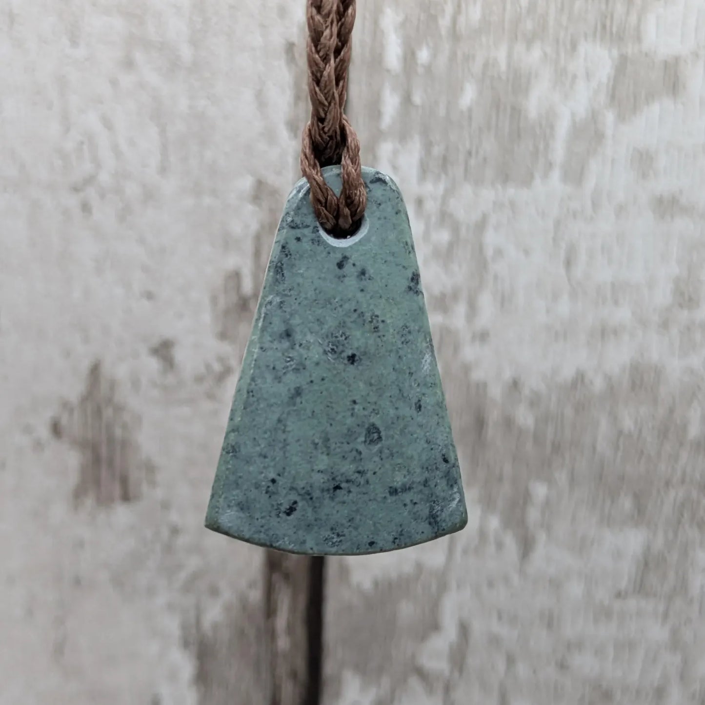 New Zealand pounamu greenstone jade her toki adze style pendant.