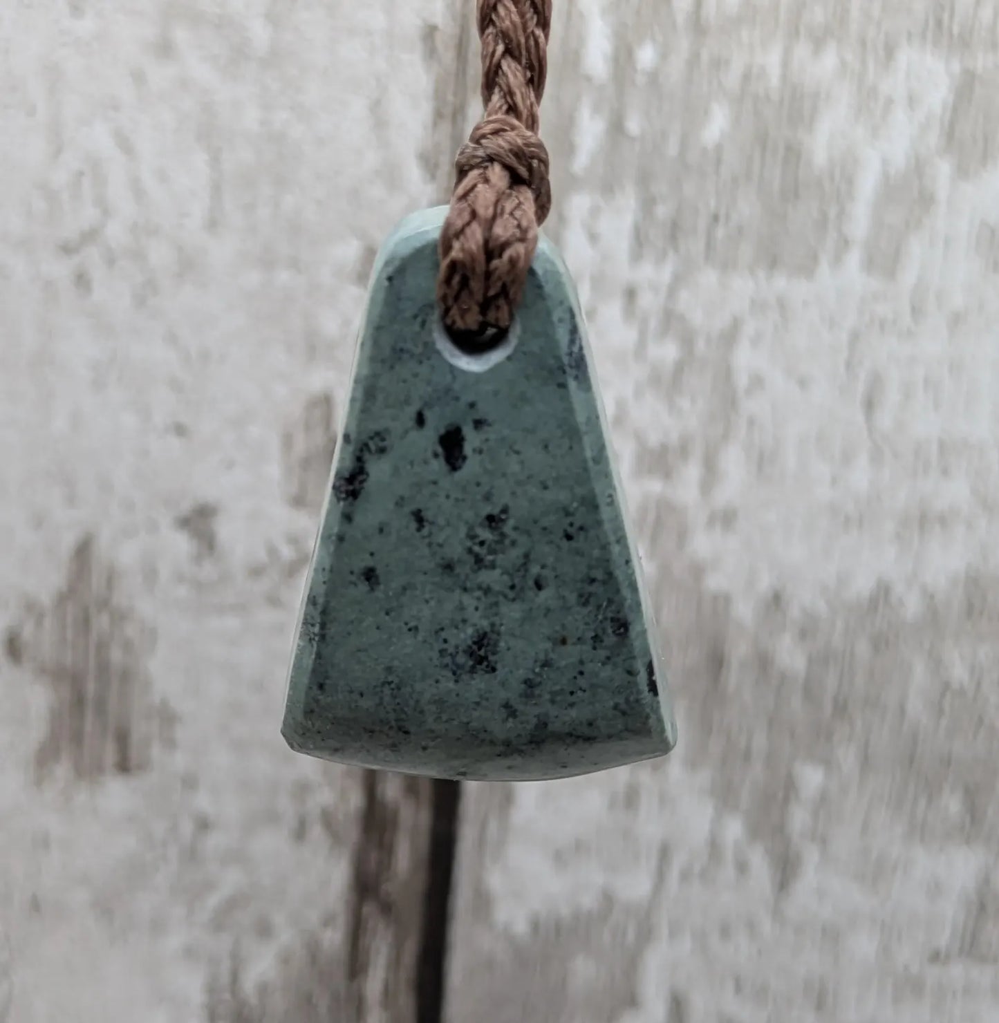 New Zealand pounamu greenstone jade her toki adze style pendant.