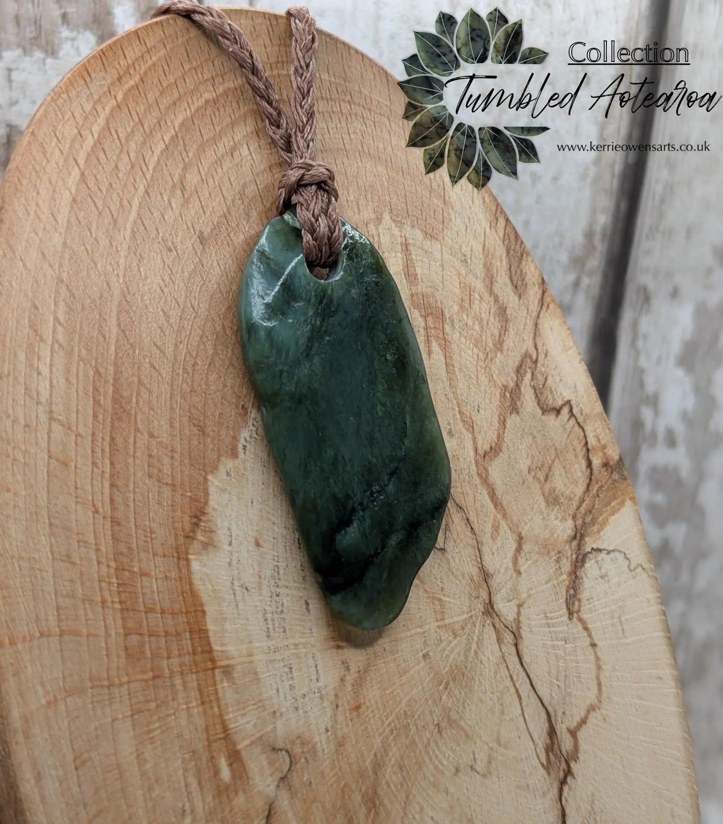 Tumbled Pounamu greenstone nephrite jade pendant.