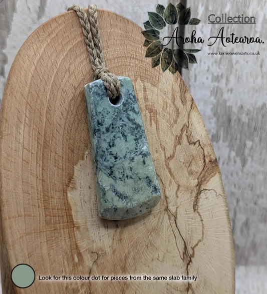 New Zealand pounamu greenstone jade hei toki adze pendant.
