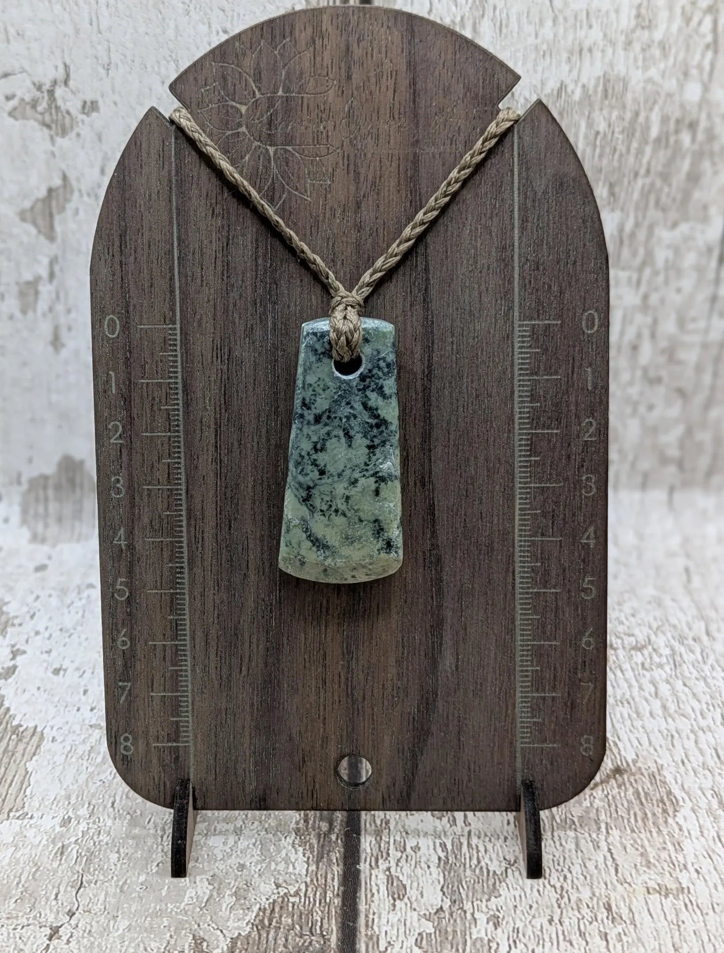 New Zealand pounamu greenstone jade hei toki adze pendant.