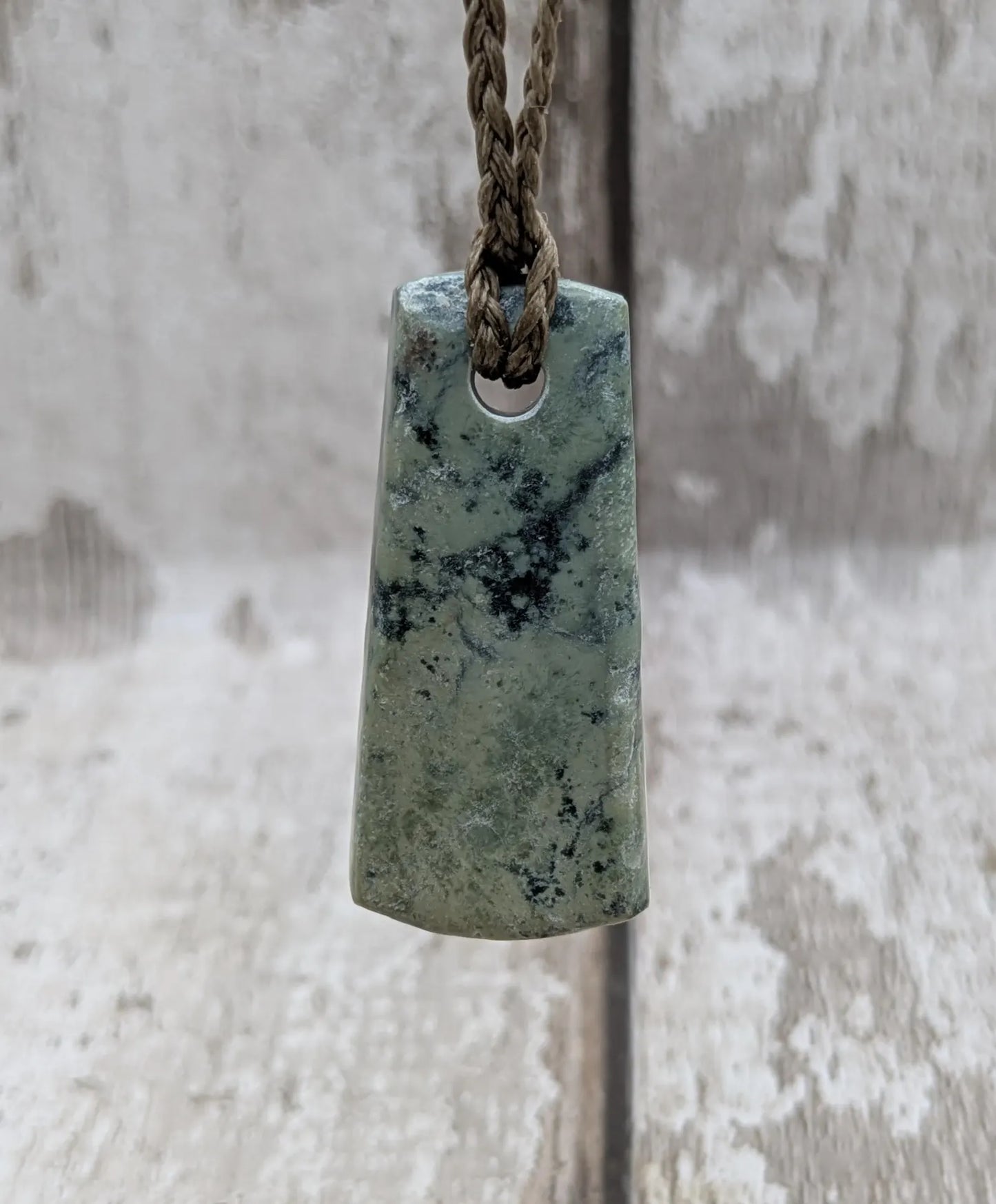 New Zealand pounamu greenstone jade hei toki adze pendant.