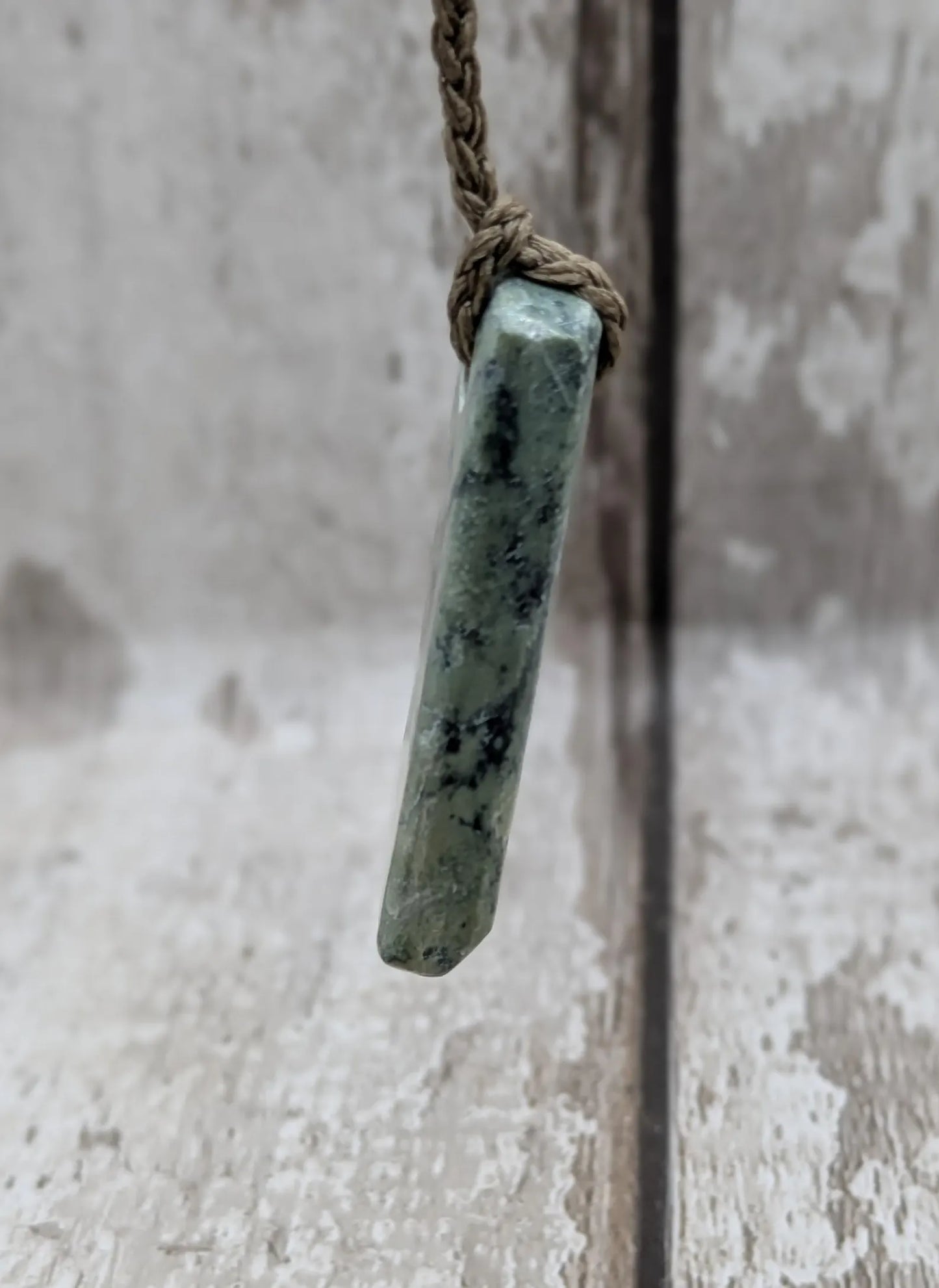 New Zealand pounamu greenstone jade hei toki adze pendant.