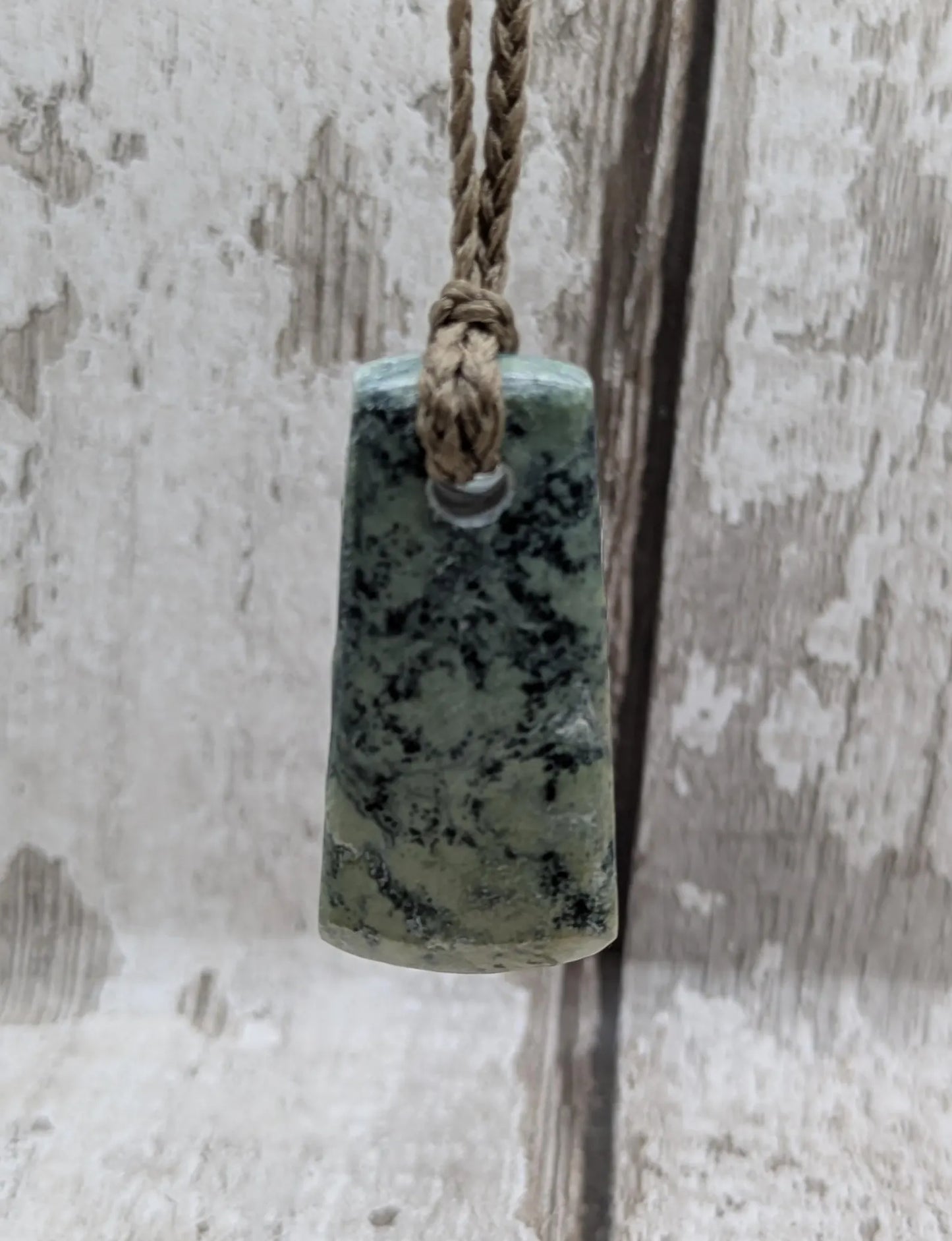 New Zealand pounamu greenstone jade hei toki adze pendant.