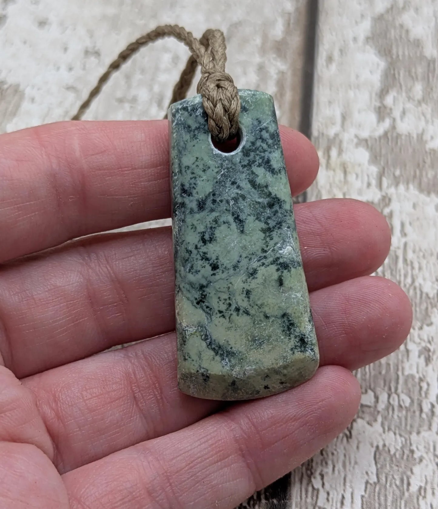 New Zealand pounamu greenstone jade hei toki adze pendant.