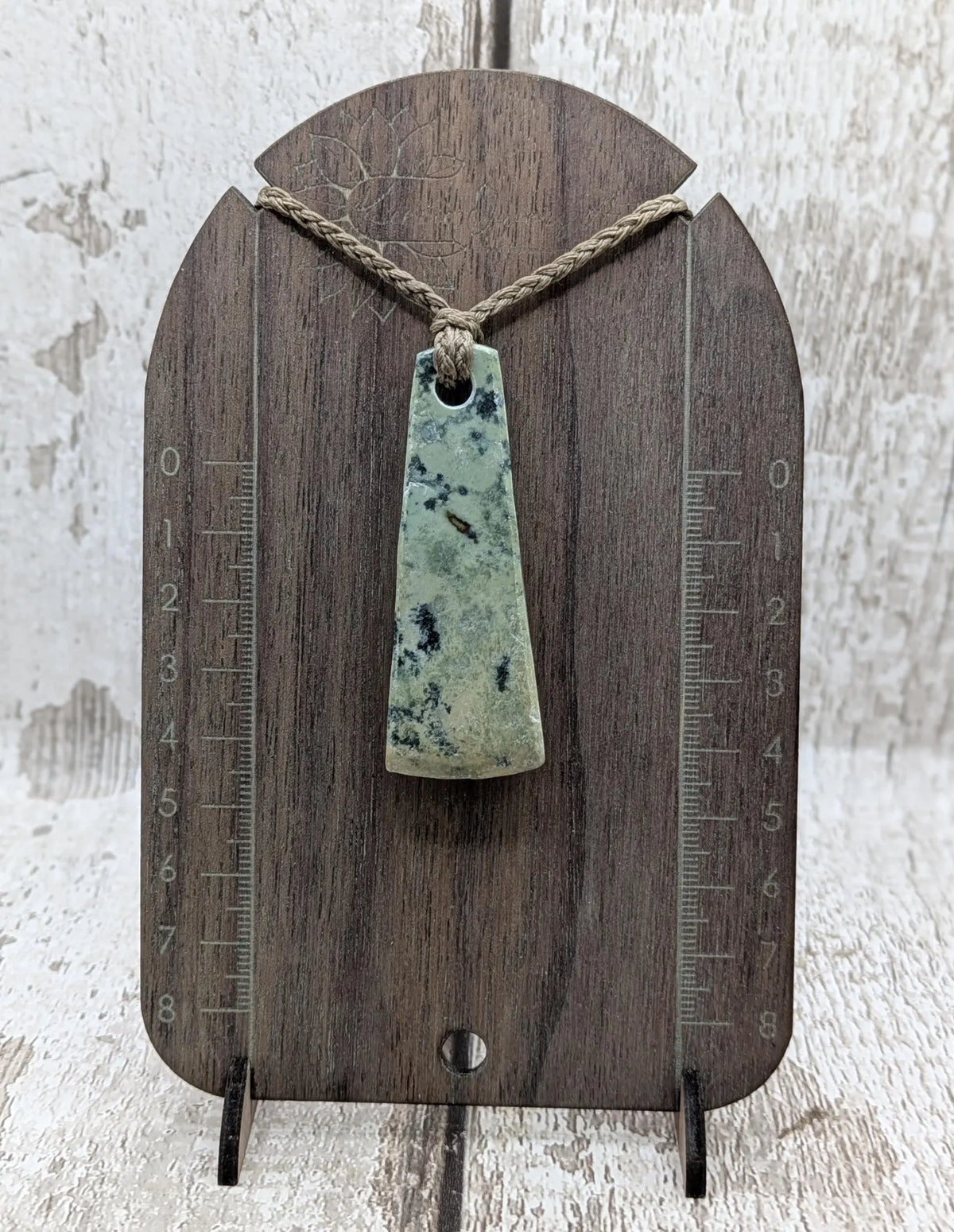 New Zealand pounamu greenstone jade raw back pendant.