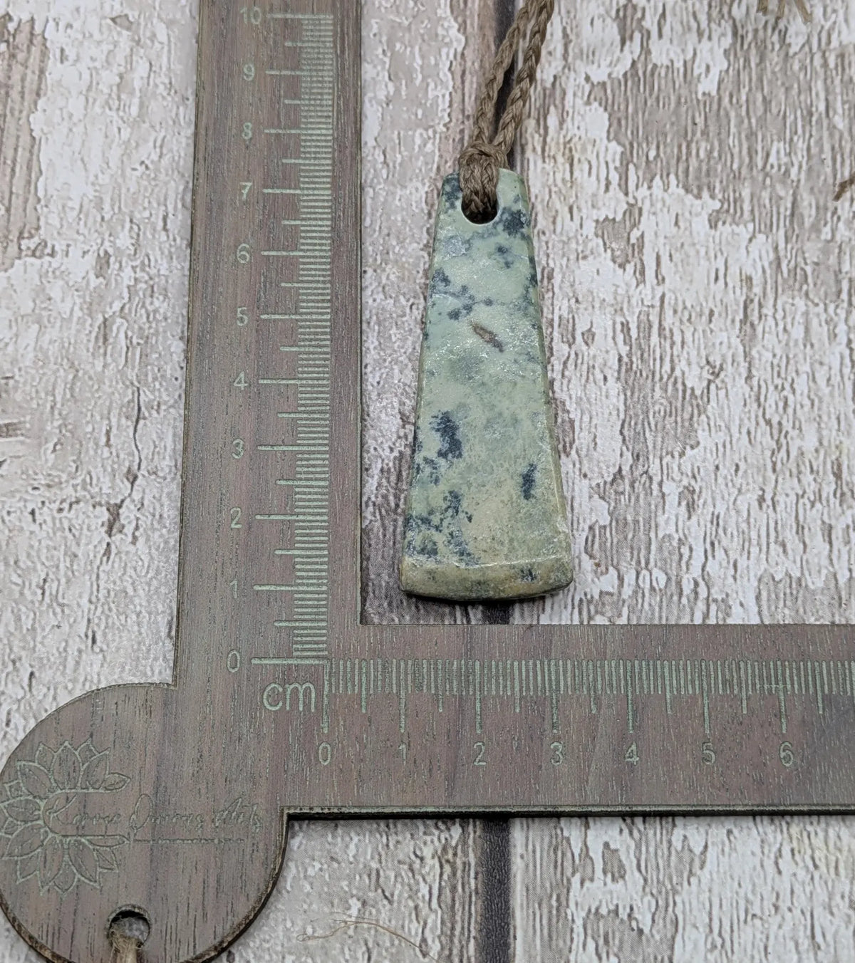 New Zealand pounamu greenstone jade raw back pendant.