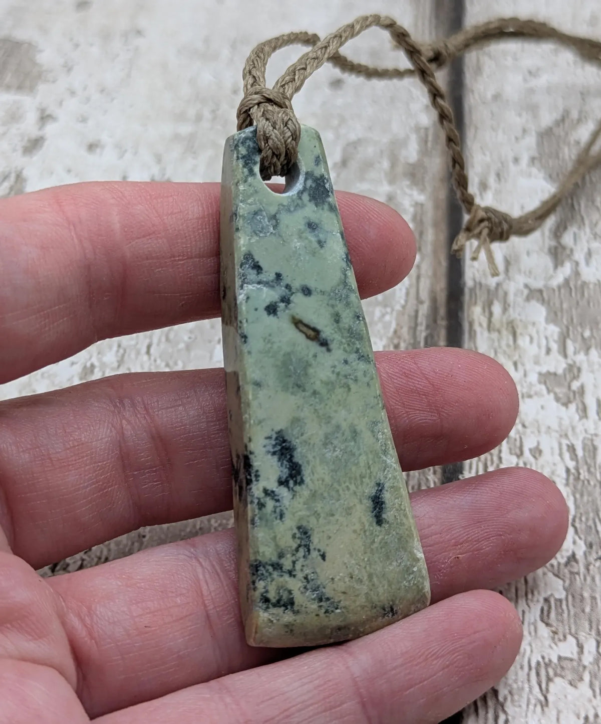 New Zealand pounamu greenstone jade raw back pendant.