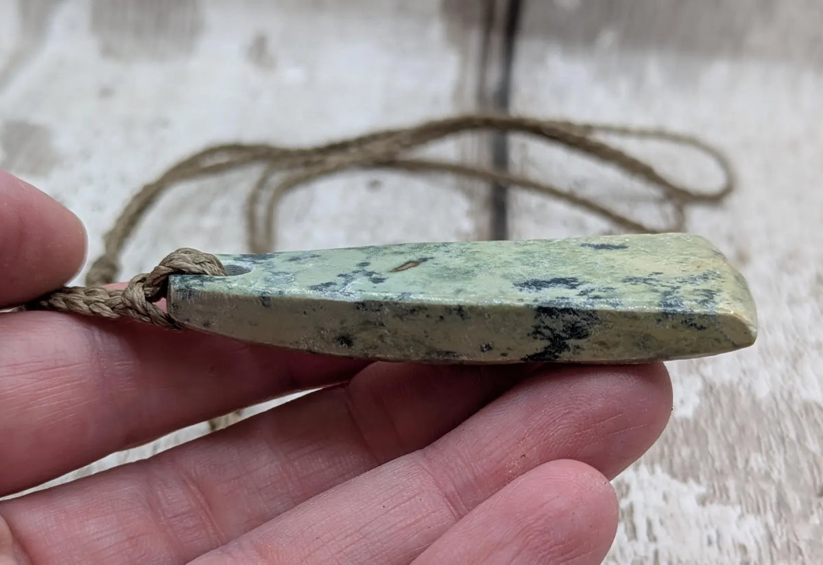 New Zealand pounamu greenstone jade raw back pendant.