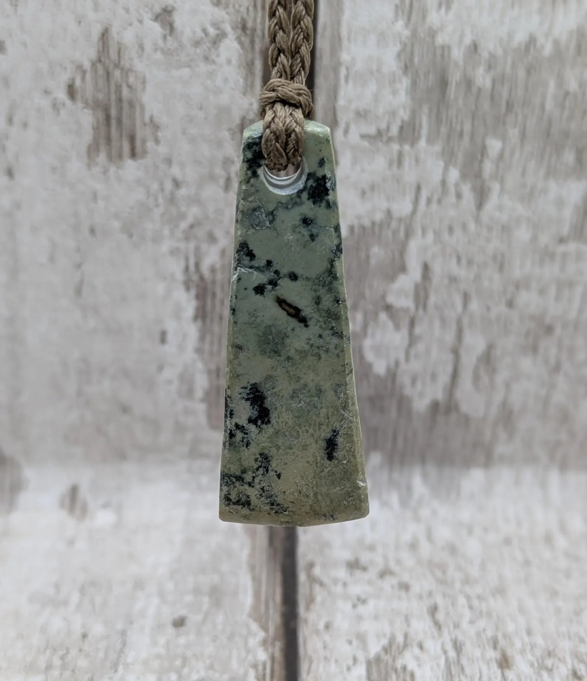 New Zealand pounamu greenstone jade raw back pendant.