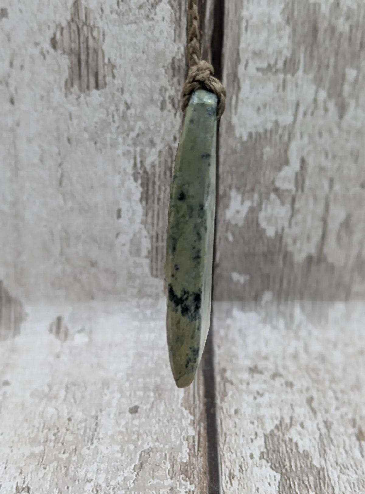 New Zealand pounamu greenstone jade raw back pendant.
