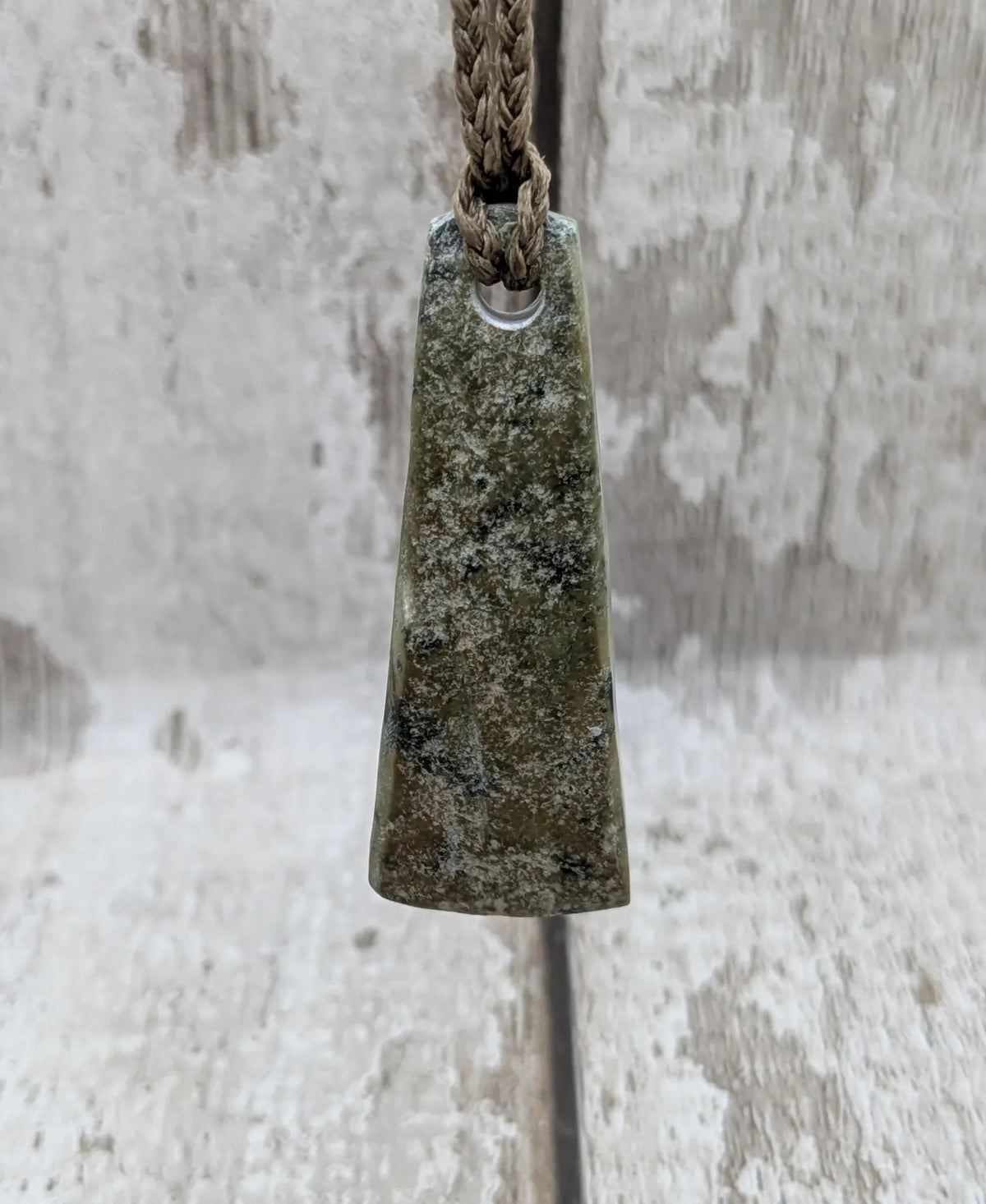 New Zealand pounamu greenstone jade raw back pendant.