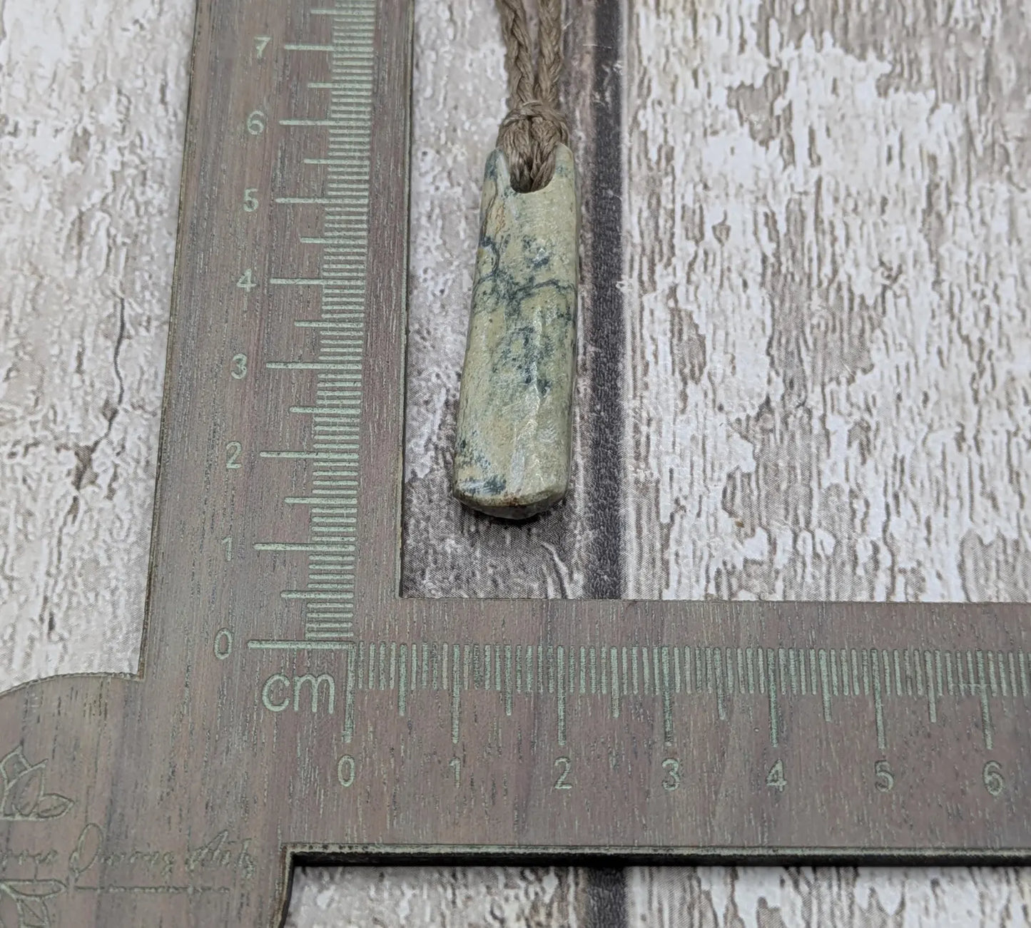 New Zealand pounamu greenstone jade raw backed pendant.