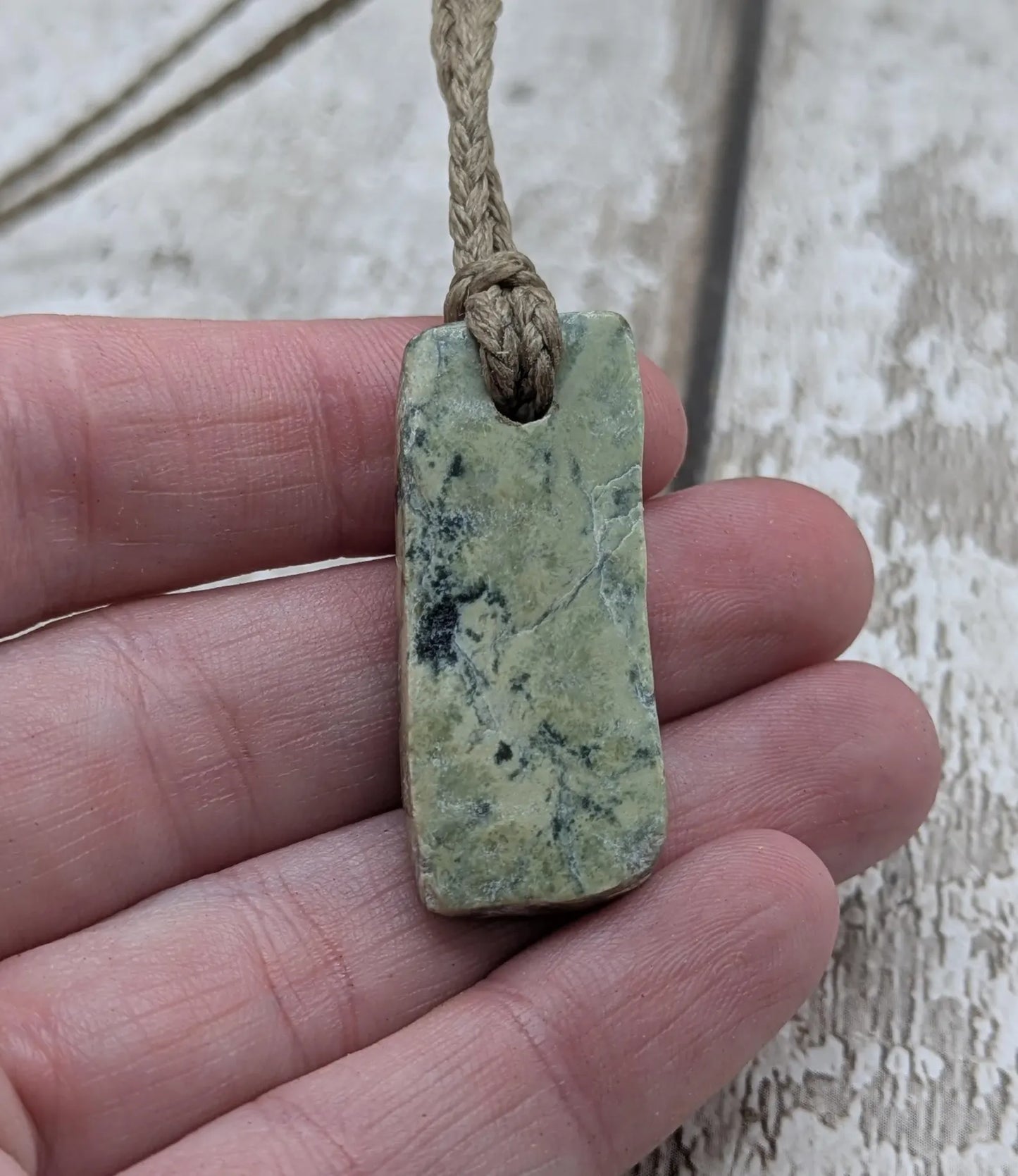 New Zealand pounamu greenstone jade slice with raw back.