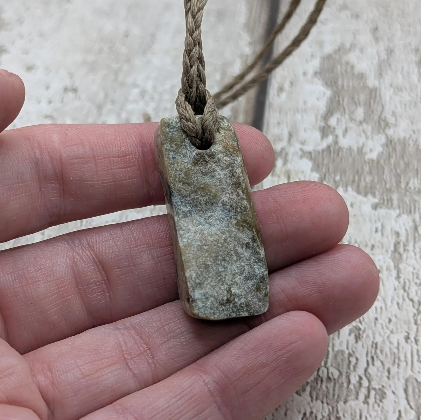 New Zealand pounamu greenstone jade slice with raw back.