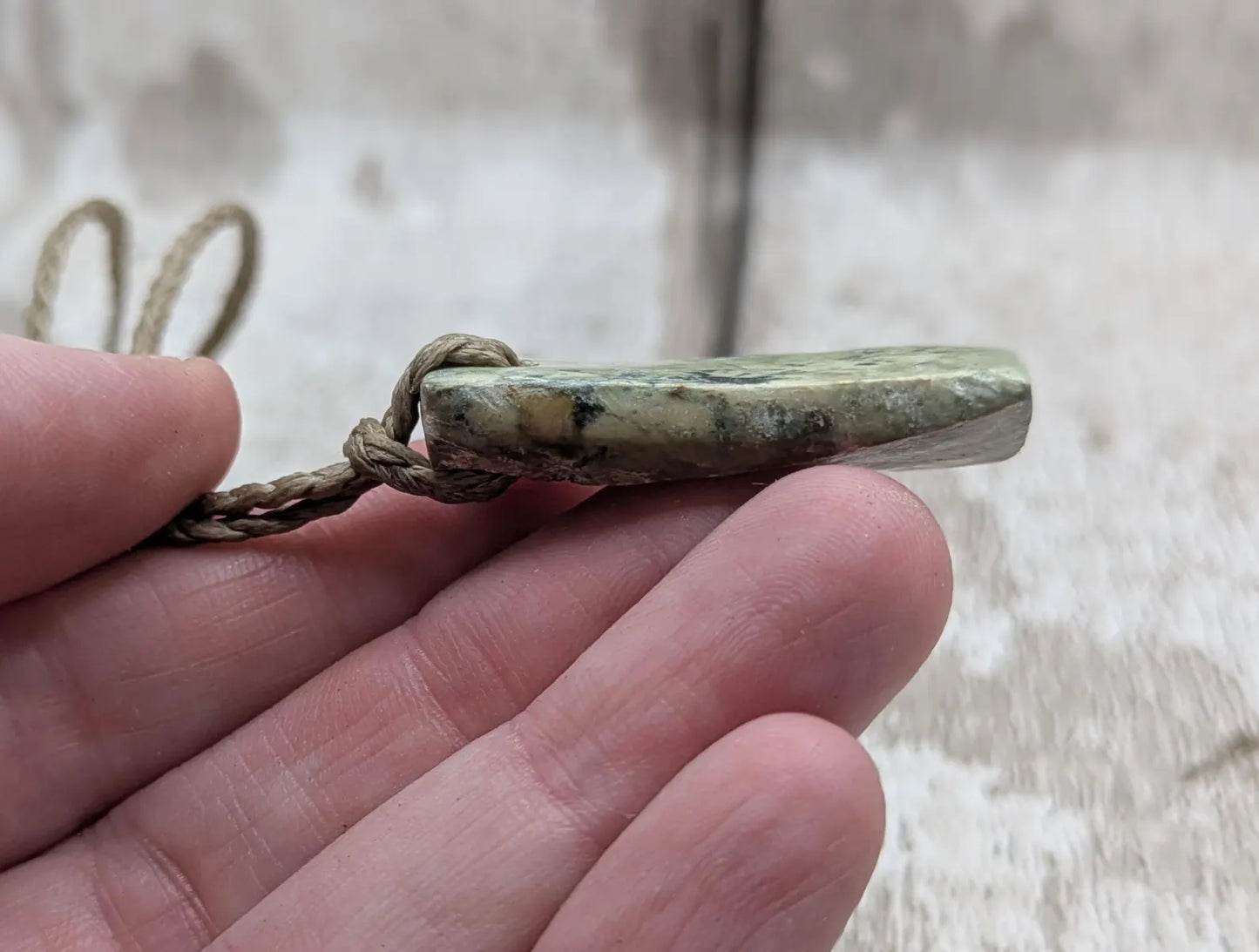 New Zealand pounamu greenstone jade slice with raw back.