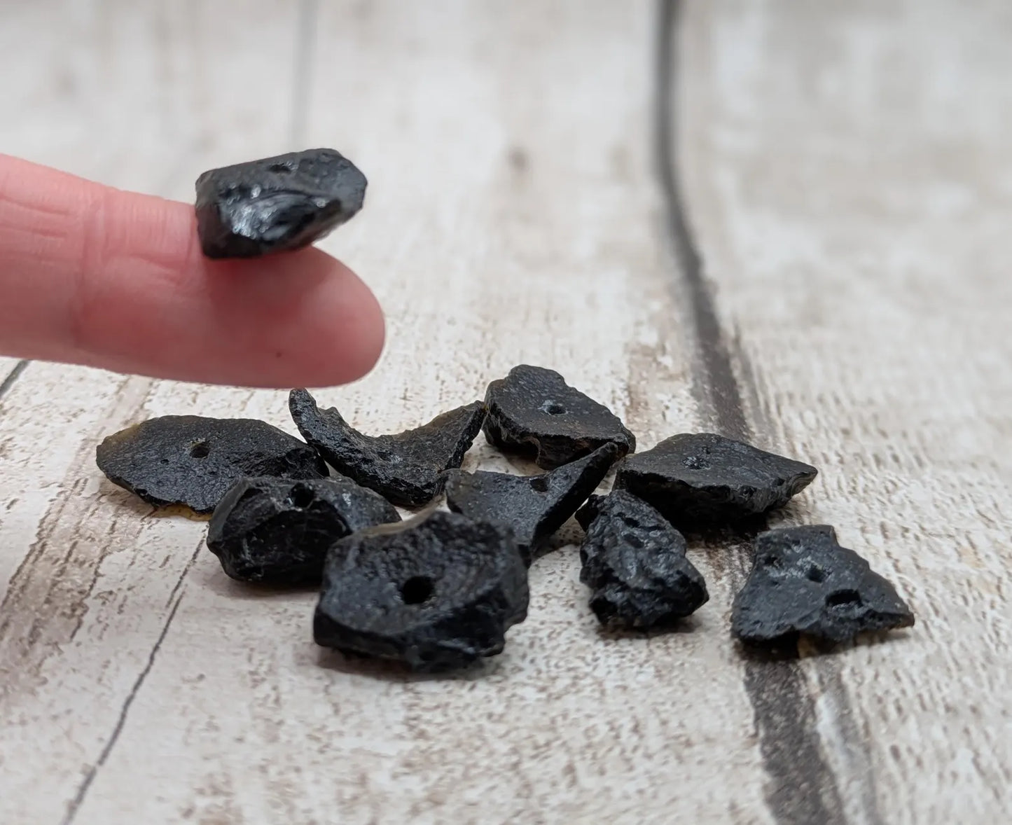 10 Indonesian tektite glass beads.