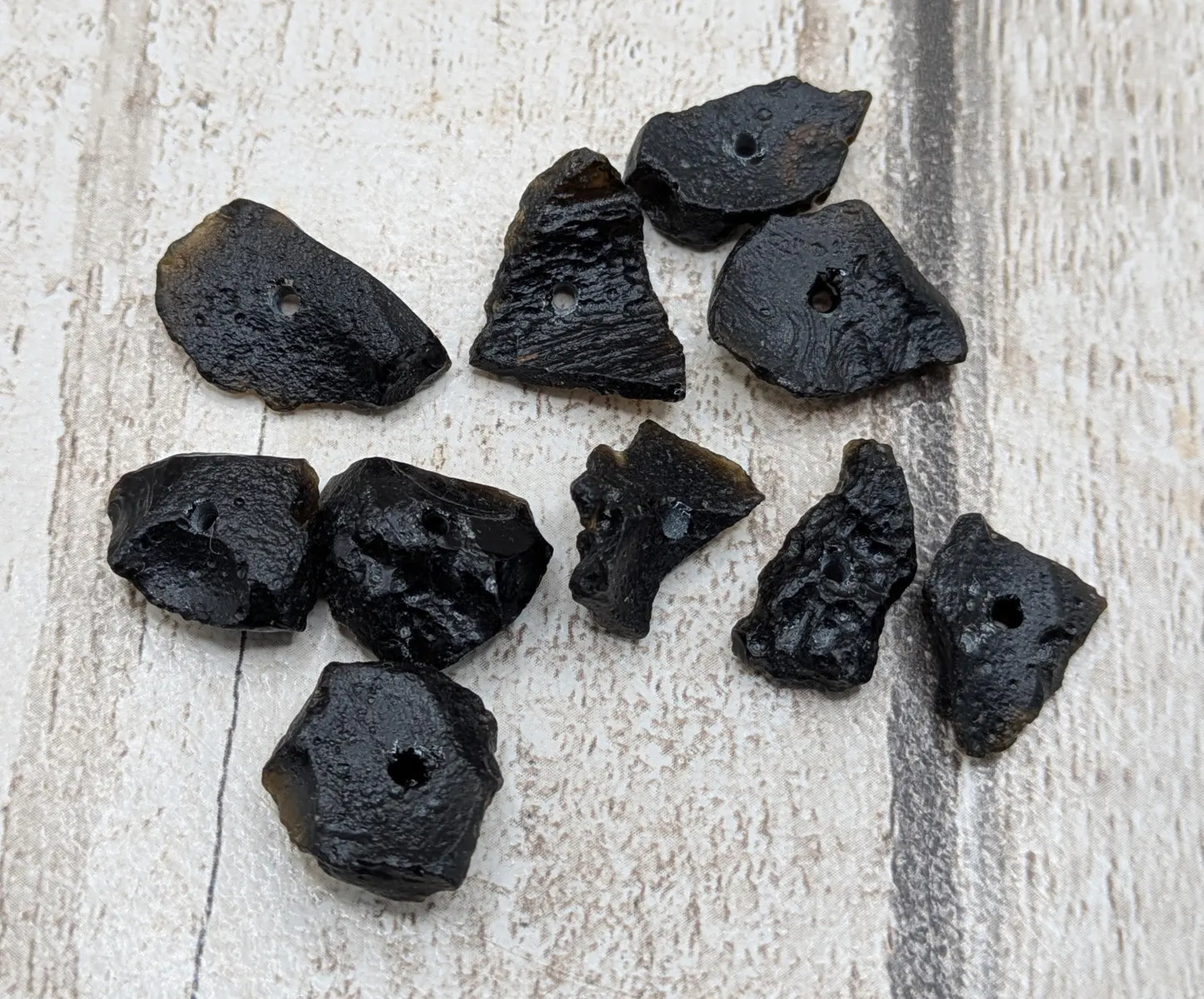 10 Indonesian tektite glass beads.