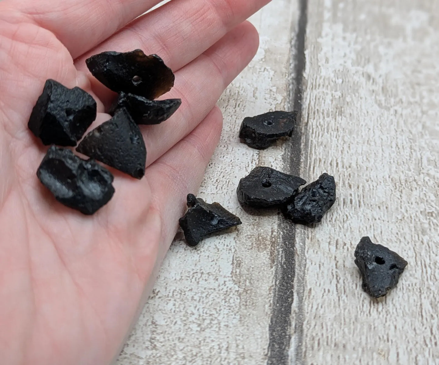 10 Indonesian tektite glass beads.