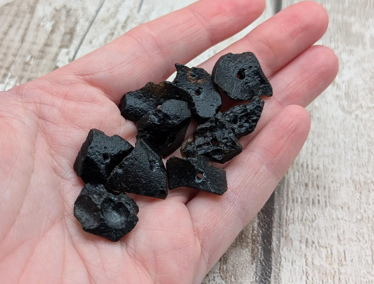 10 Indonesian tektite glass beads.
