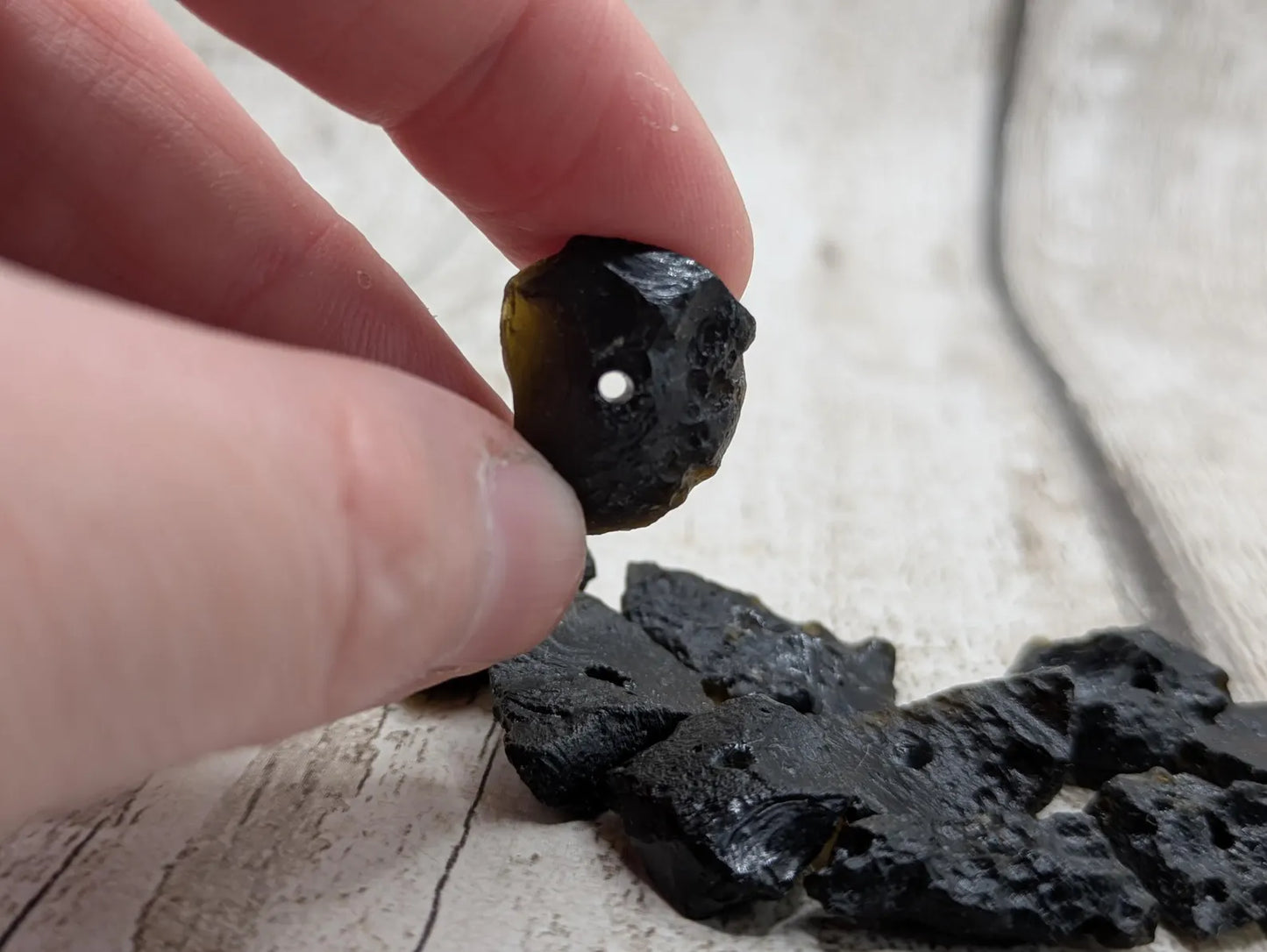 10 Indonesian tektite glass beads.