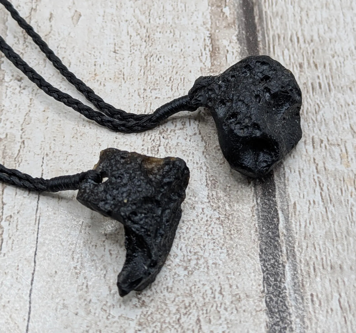 One Indonesian meteorite tektite impact glass pendant.