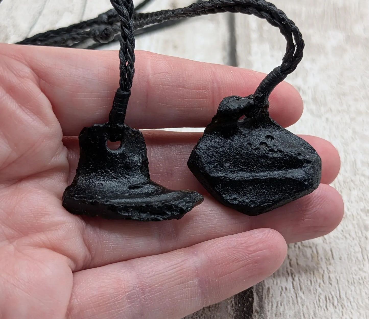One Indonesian meteorite tektite impact glass pendant.