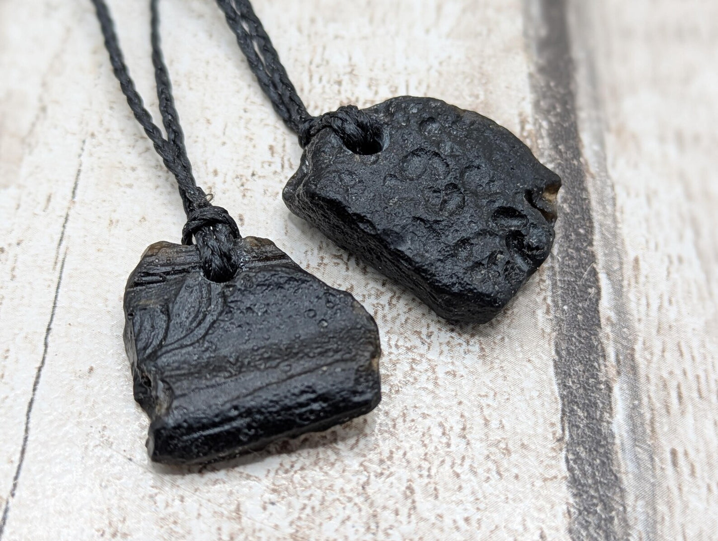 One small Indonesian impact tektite glass pendants.