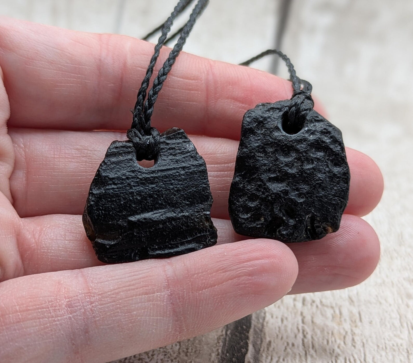 One small Indonesian impact tektite glass pendants.
