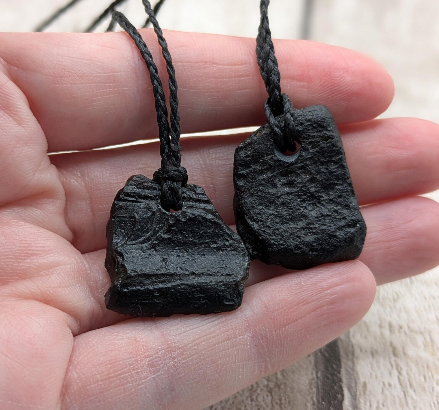 One small Indonesian impact tektite glass pendants.