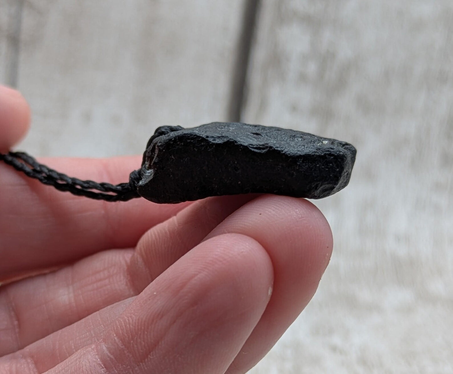 One small Indonesian impact tektite glass pendants.