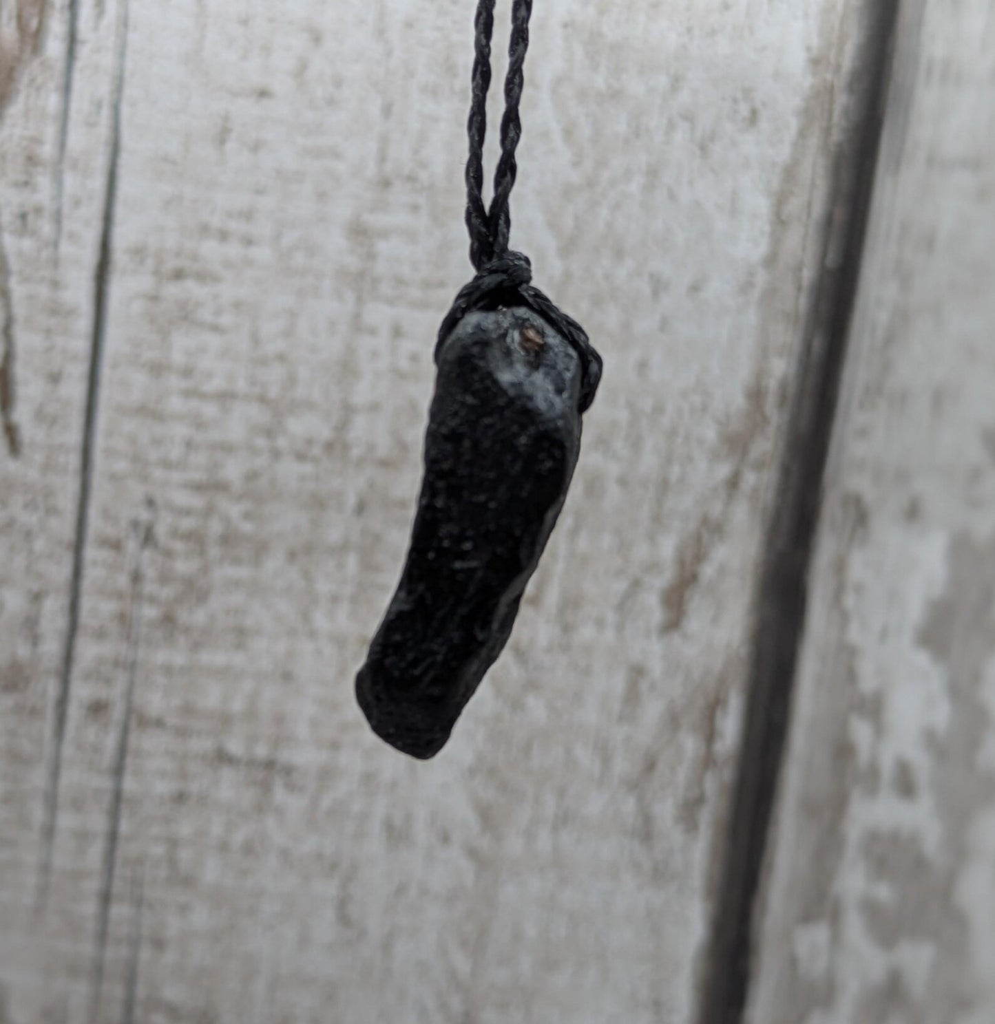 One small Indonesian impact tektite glass pendants.