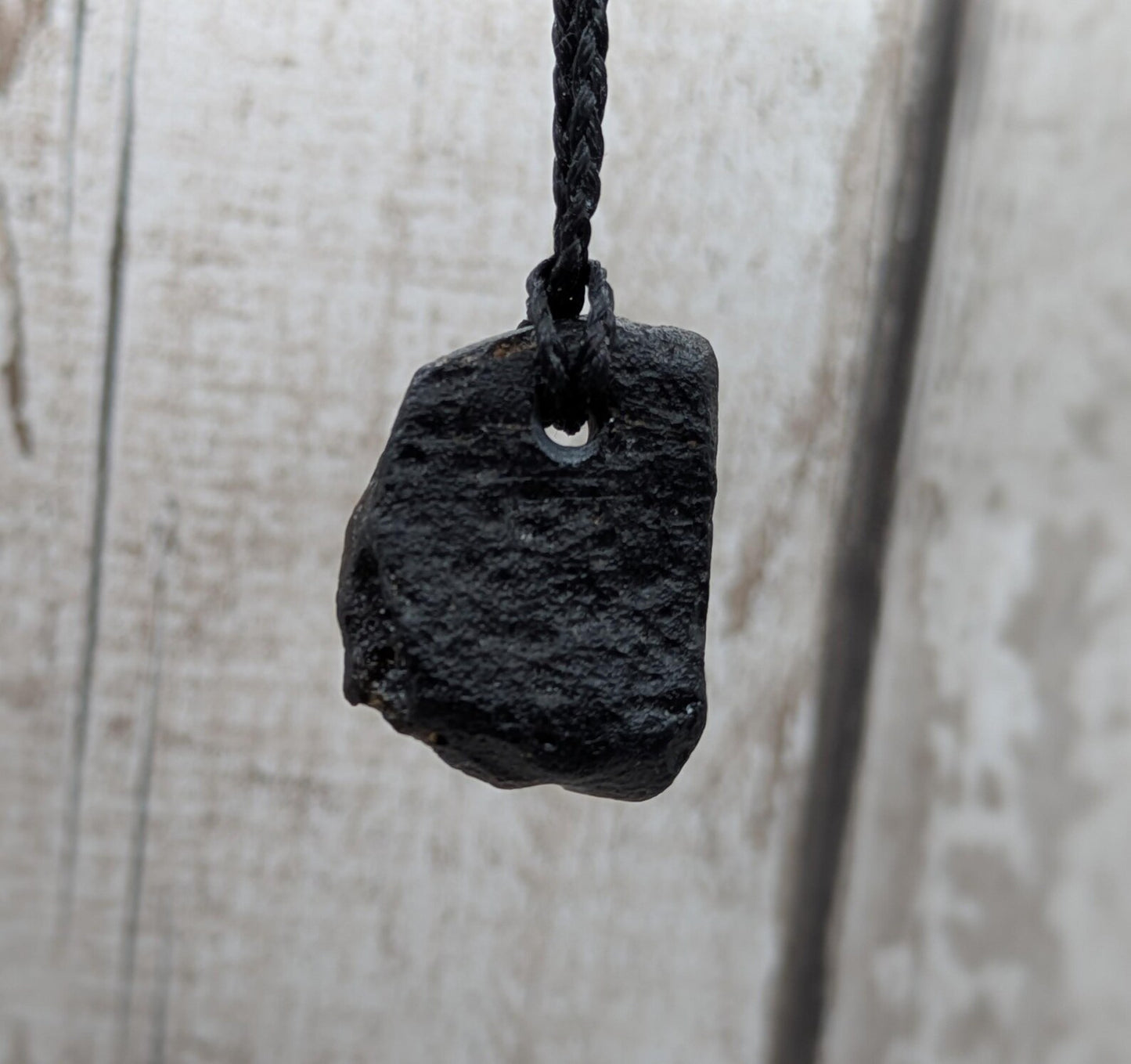 One small Indonesian impact tektite glass pendants.