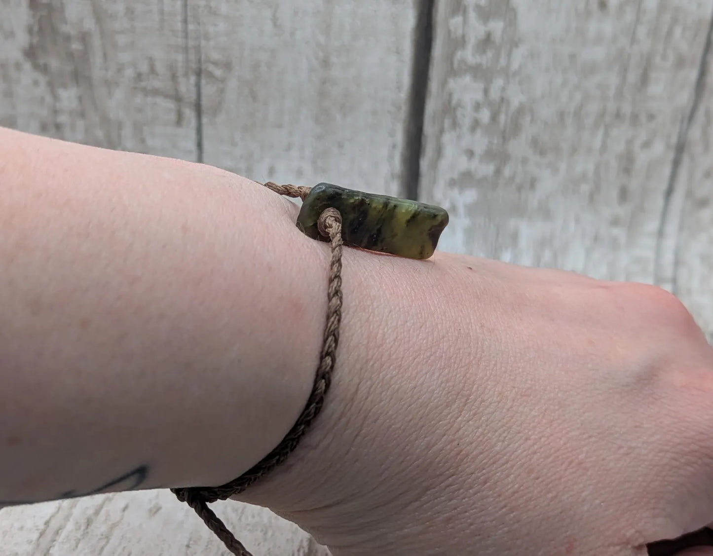 Tumble polished Pounamu greenstone jade adjustable bracelet.