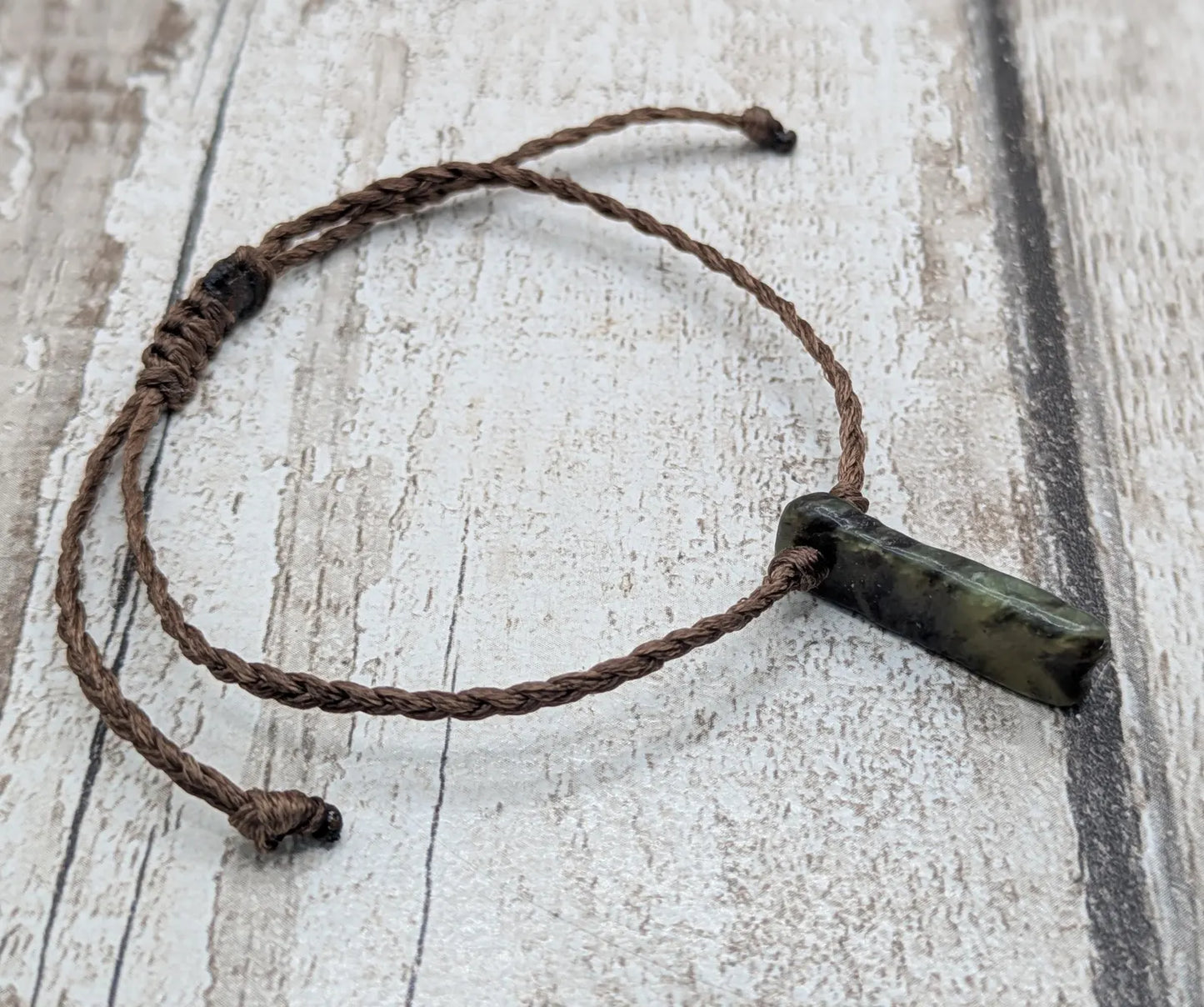 Tumble polished Pounamu greenstone jade adjustable bracelet.