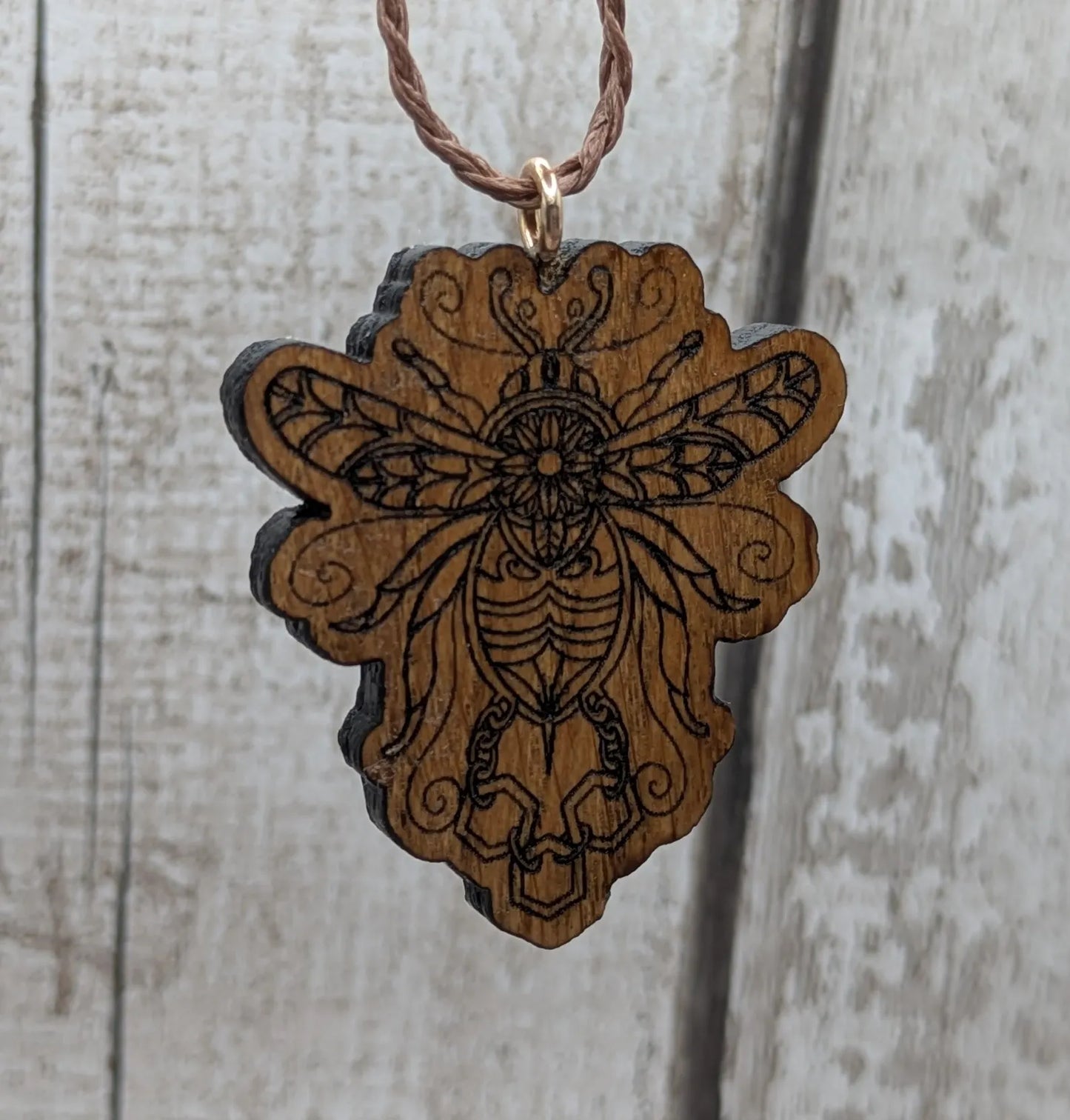 Oak wood, laser printed bumble bee pendant.