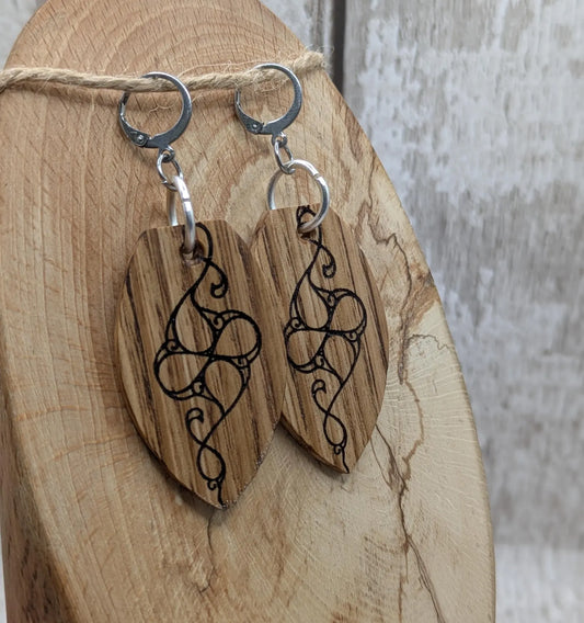 Oak wood British museum Celtic pattern book design earrings with stainless steel findings.