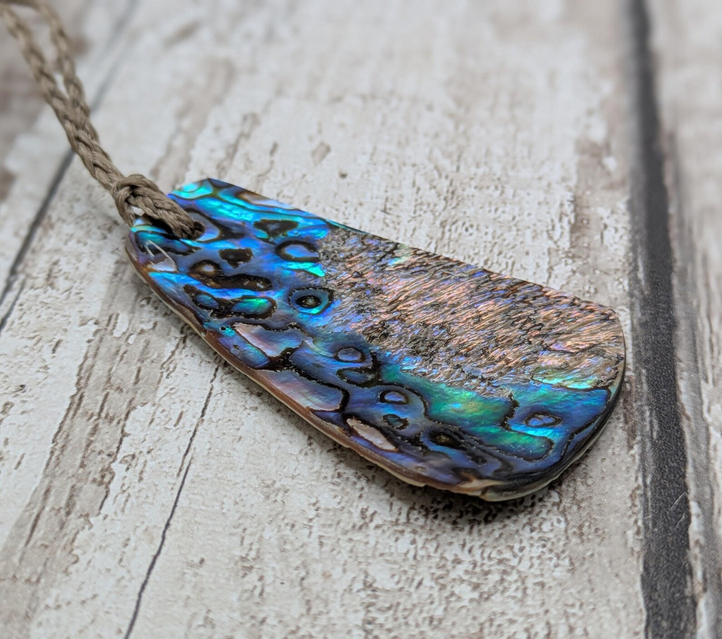 new Zealand rainbow pāua abalone pendant, ocean linked, iridescent Talisman, statement pendant