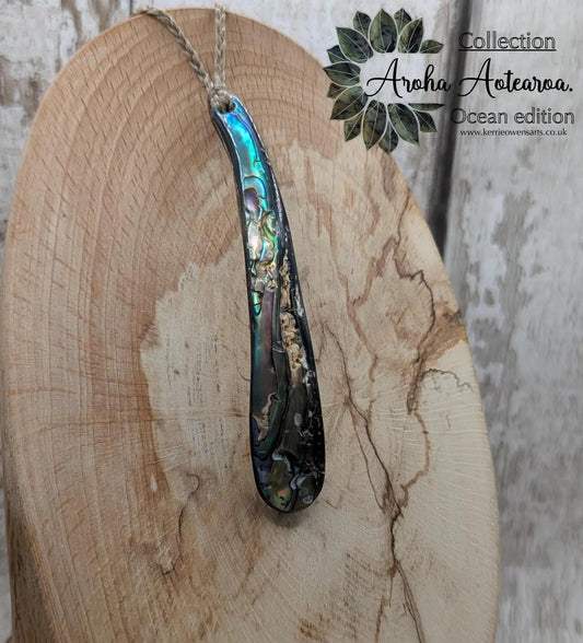 New Zealand rainbow pāua rim drop pendant.