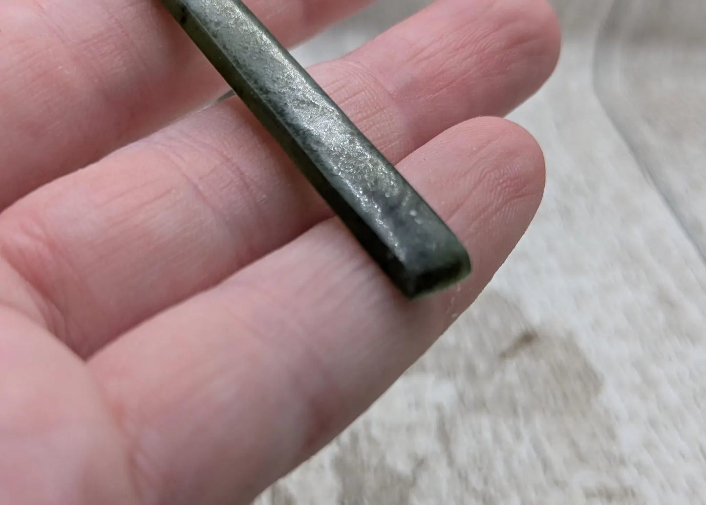 New Zealand pounamu nephrite jade greenstone thin Toki drop pendant. With silver bail.