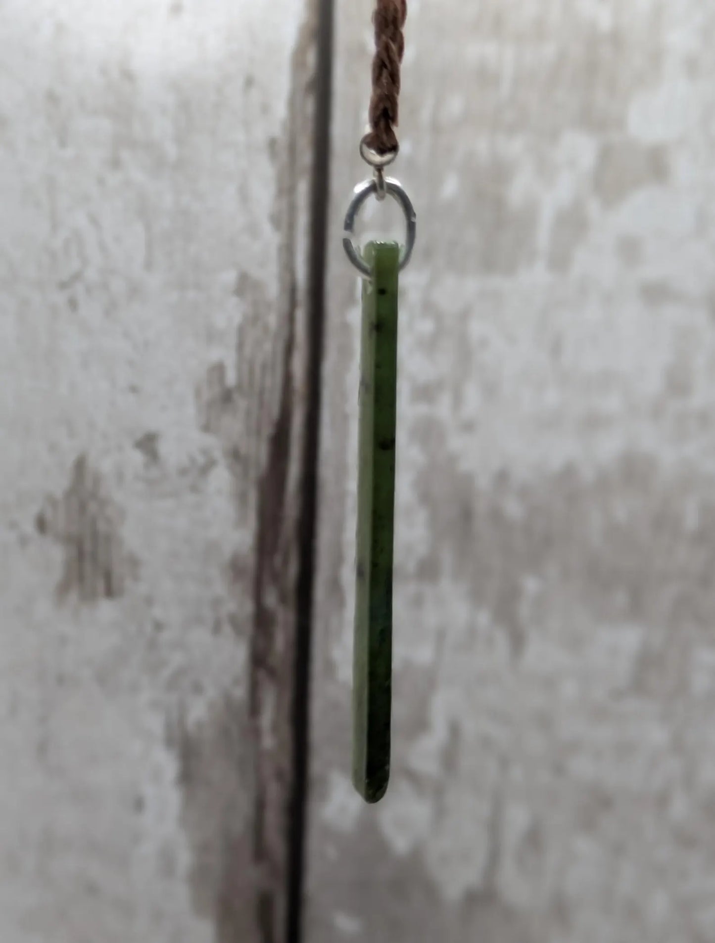 New Zealand pounamu nephrite jade greenstone thin Toki drop pendant. With silver bail.