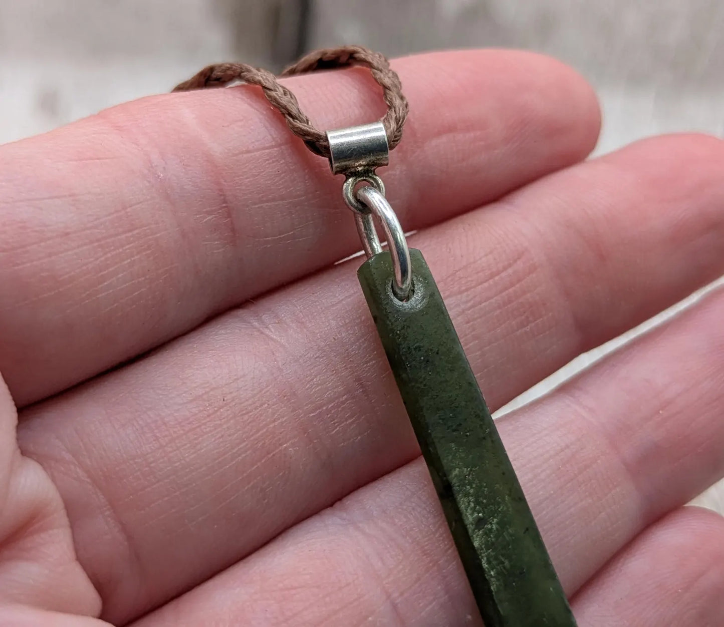 New Zealand pounamu nephrite jade greenstone thin Toki drop pendant. With silver bail.
