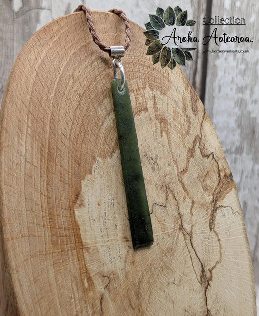 New Zealand pounamu nephrite jade greenstone thin Toki drop pendant. With silver bail.