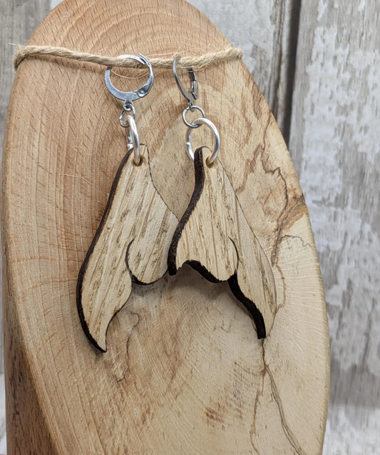 Sweet chestnut whales tail earrings with stainless steel findings.